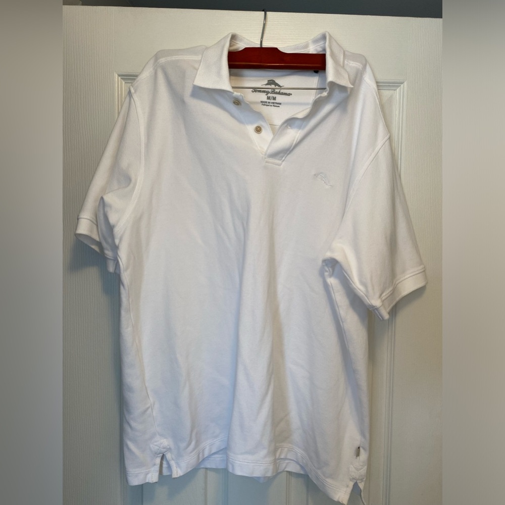Men’s medium white Tommy bahama short sleeve polo.  No rips and stains.